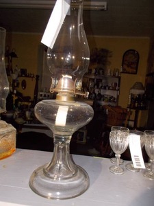 lot 220 image: This is an antique clear glass kerosene oil lamp