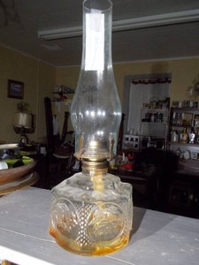 lot 221 image: a vintage clear glass oil lamp