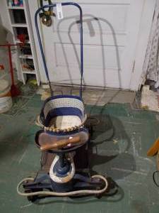 lot 246 image: This is a vintage Taylor-Tot baby walker and stroller.