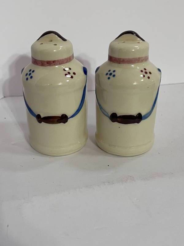 lot 47 image: Pair of Shawnee Milk Can S&P