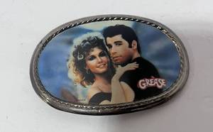 lot 34 image: Collectible Grease Belt Buckle