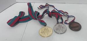 lot 12 image: Three Special Olympics Metals Gold Silver and Bronze