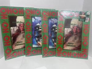 lot 39 image: 4 -3-D Animated Christmas Gift Boxes