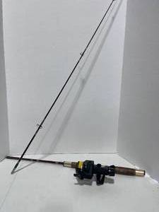 lot 132 image: Rod and Reel Shimano FX 300 Graphite