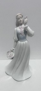 lot 99 image: Unmarked Porcelain Woman with Flower Figurine