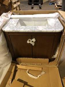 lot 64 image: Home Decorators Collection Collette 30 in. Single Sink Cinnamon Oak Bath Vanity with White Carrara Marble Top (Assembled) Granite Top Broken  Customer Returns See Pictures
