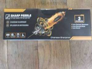 lot 146 image: Sharp Pebble Chain Saw Sharpener...
