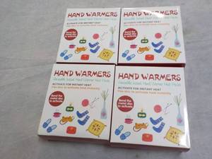 lot 239 image: 4 Reusable Hand Warmers Packs...