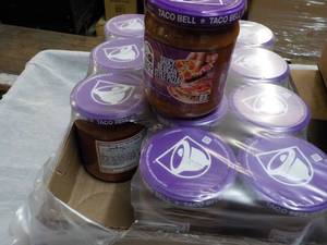 lot 247 image: 12 jars Taco Bell Pizza Dip...