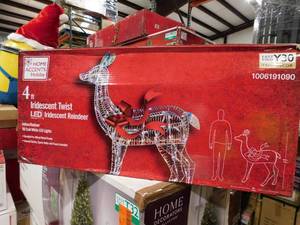 lot 90 image: Home Accents Holiday 4 ft. Iridescent Twist LED Iridescent Reindeer Holiday Yard Decoration Y30