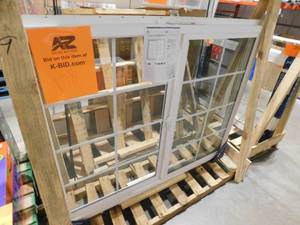 lot 178 image: JELD-WEN V-2500 Series 59.5 in. W x 47.5 in. H Left-Handed White Vinyl Low-E Sliding Window wBrickmould Nail Fin Frame and Grids