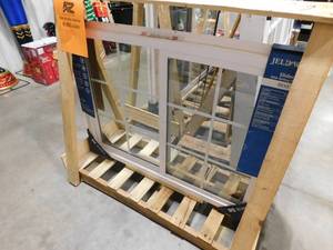 lot 183 image: JELD-WEN V-2500 Series 47.5 in. W x 35.5 in. H Left-Handed White Vinyl Low-E Sliding Window wBrickmould Nail Fin Frame and Grids