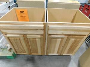 lot 203 image: (2) Hampton Bay Hampton 24 in. W x 21 in. D x 34.5 in. H Assembled Bath Base Cabinet in Natural Hickory without Shelf