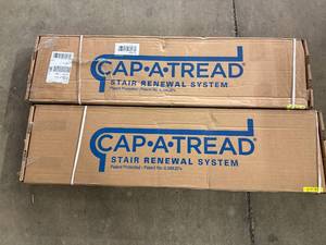 lot 18 image: 2 X 2 Pack Of Cap A Tread Stair Covers