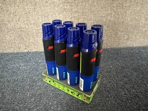 lot 92 image: 8 Pack Of Tailgate Torches With Bottle Opener