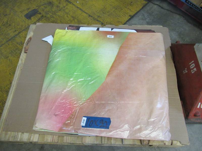 lot 210 image: 10 x 24 5 oz. Black Tarp w Advertisement  Reused Billboard  7 mil Lightweight Duty - A Grade