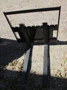 lot 23 image: Skid steer fork attachment, forks a...