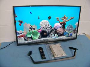 lot 111 image: Sony 40 4K HDR Ultra HD (UHD) TV  Television with Remote Control and Stand