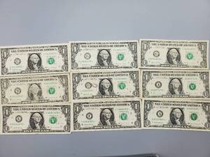 lot 68 image: 9 $1 U.S. Star Federal Reserve Notes