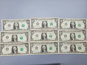 lot 71 image: 9 $1 U.S. Star Federal Reserve Notes