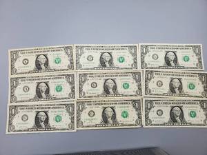 lot 72 image: 9 $1 U.S. Star Federal Reserve Notes