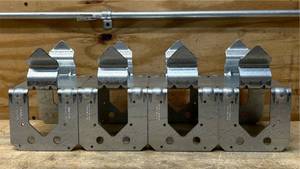 lot 67 image: Simpson Strong-Tie ZMax 5.25 in. H X 5.5 in. W 12 Ga. Galvanized Steel Post Base lot of 4
