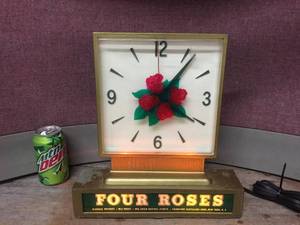 lot 103 image: Nifty Vintage Four Roses Blended Whiskey - Light Up Clock - Works