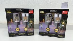 lot 93 image: 2 Boxes Infinity X1 Solar Motion Path Lights, 4 Total, 500 Lumens Each