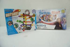 lot 111 image: Frozen II Surprise Slides & Marble Mania Hot Shot Games