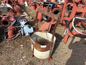 lot 36 image: Steel lifting attachment with bucket possibly designed for mortar lifting H 46 x W 26