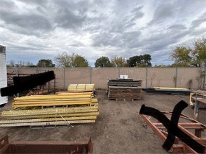 lot 7 image: Industrial Steel pallet racking cross beamsuprights, disassembled. Plywood sheets for shelves.