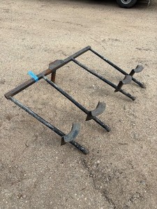lot 42 image: Attachment for lifting or moving possibly pipes