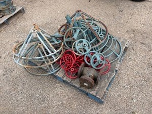 lot 48 image: Pallet of valve hand wheels and protective frames. One valve body.