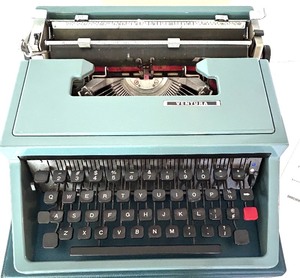 lot 169 image: Olivetti Underwood Ventura Portable Typewriter with Case and Instructions