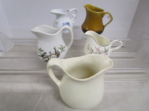 lot 57 image: Milk & Cream Pitchers