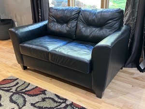lot 20 image: FLR - Black Faux Leather Loveseat Sofa