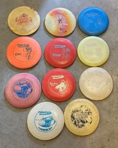 lot 47 image: G - Set of 12 Innova Golf Discs with Lightning Disc Bag