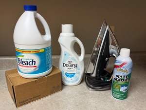 lot 104 image: LNDRY - Household Laundry Lot with Bleach, Fabric Softener, Spray Starch, and Iron