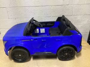 lot 460 image: Cadillac Escalade IQ 24V Kids Ride on Car,Wisairt 2 Seater Battery Powered Electric Vehicle w Remote Control(Blue)