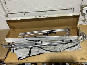 lot 187 image: KAKIT 34 Bow Bimini Tops for Boats with Easy to Install Sidewalls 2 Rear Support Poles  2 Straps  Storage Boot, 8Lx54 Hx85-90 W