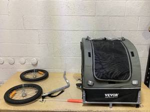 lot 96 image: VEVOR Dog Bike Trailer, Supports up to 88 lbs, Pet Cart Bicycle Carrier, Easy Folding Frame with Quick Release Wheels, Universal Bicycle Coupler, Reflectors, Flag, Collapsible to Store, BlackGray