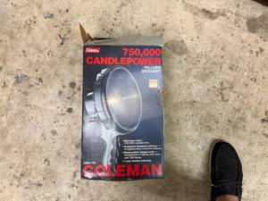 lot 35 image: Coleman 750,000 Candle Power Halogen Spotlight