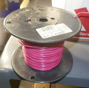 lot 17 image: Red 14 AWG Solid copper wire about 250ft