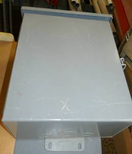 lot 22 image: Small electrical enclosure box 12X10X6, Plus a group of aluminum boxes
