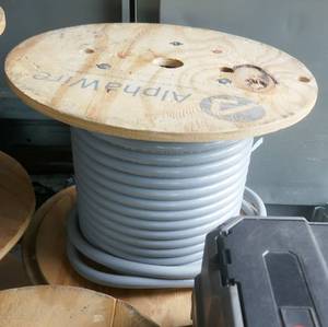 lot 29 image: 16AWG 600V 90C 18 conductor Unshielded PVC Jacket Xtra-guard Flex cable from Alphawire was a 100 ft roll, looks like it is 80% full.  $930 new