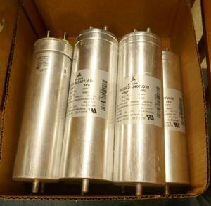 lot 33 image: Lot of Seven Large capacitors