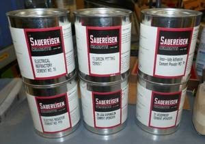 lot 39 image: 6 Cans of Various types of dry powder cements