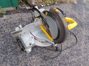 lot 9 image: 12 Dewalt Compound Mitre Saw