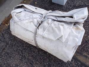 lot 78 image: Large White Tarp good for woodpile may have holes or rips