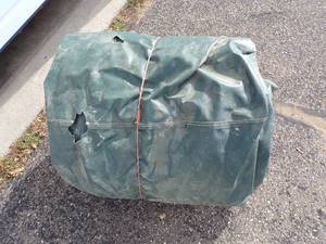 lot 80 image: Large  Tarp good for woodpile may have holes or rips
